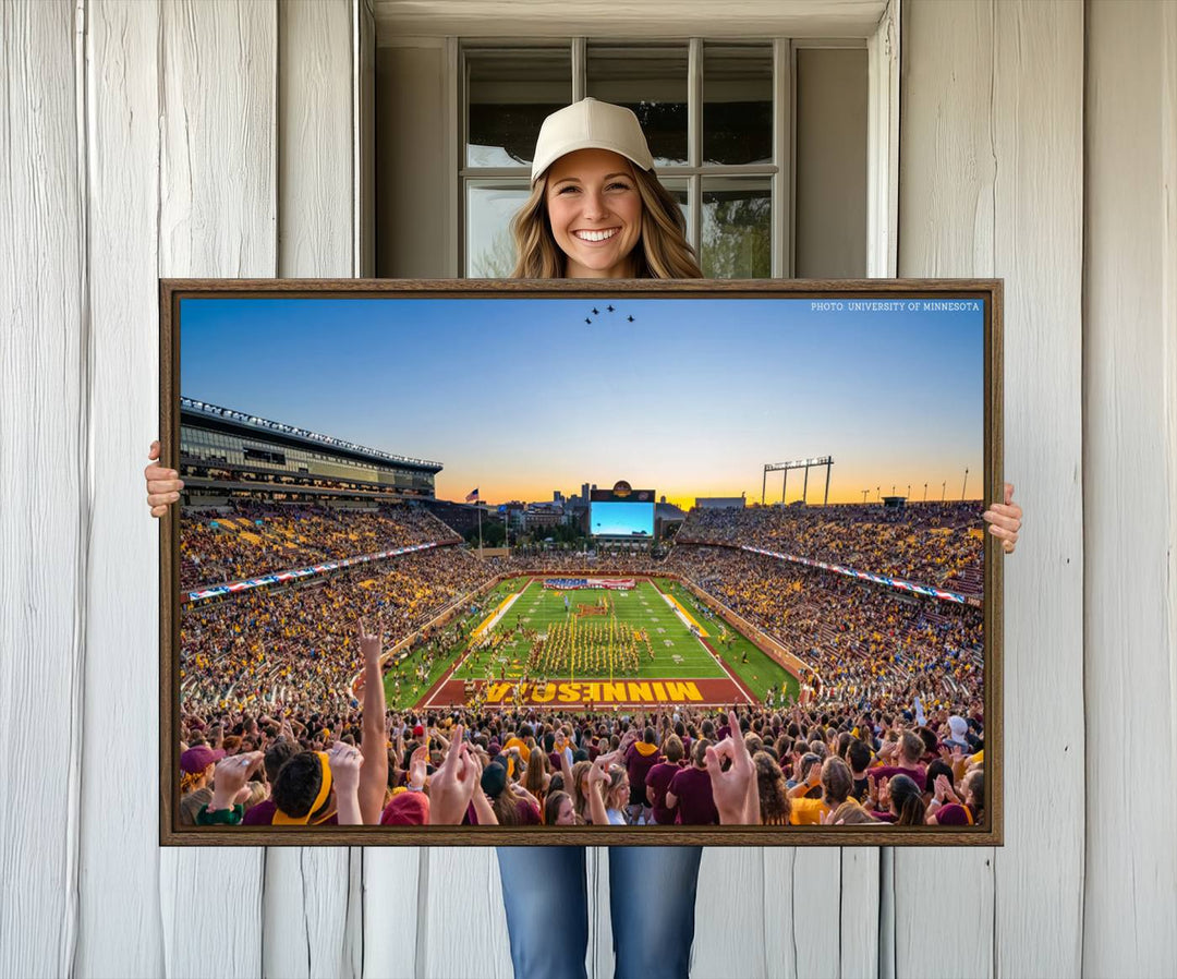 The University of Minnesota Golden Gophers Football Team Print, capturing a sunset scene, is ideal for gallery-quality wall art.