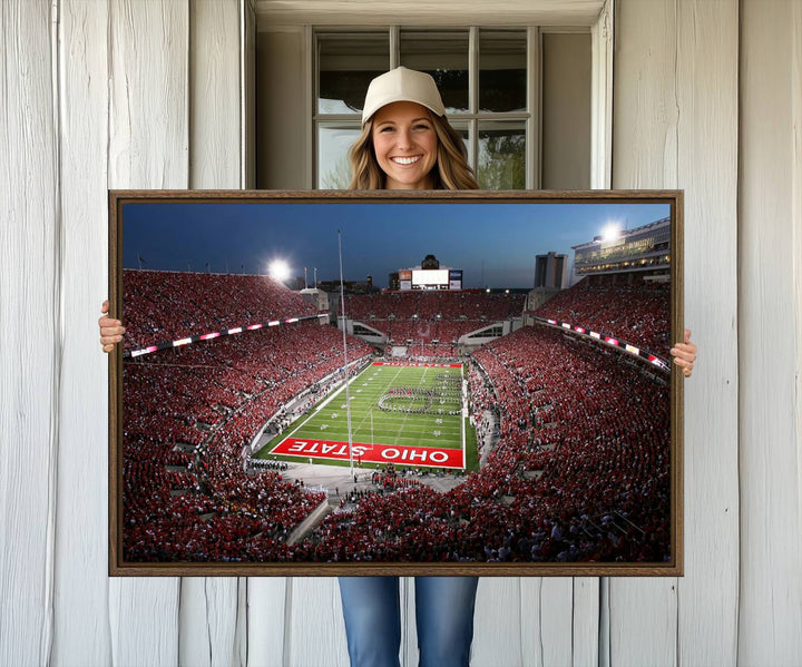 Premium gallery-quality canvas wall art featuring an aerial view of a packed Ohio State stadium at dusk, highlighting the Buckeyes.