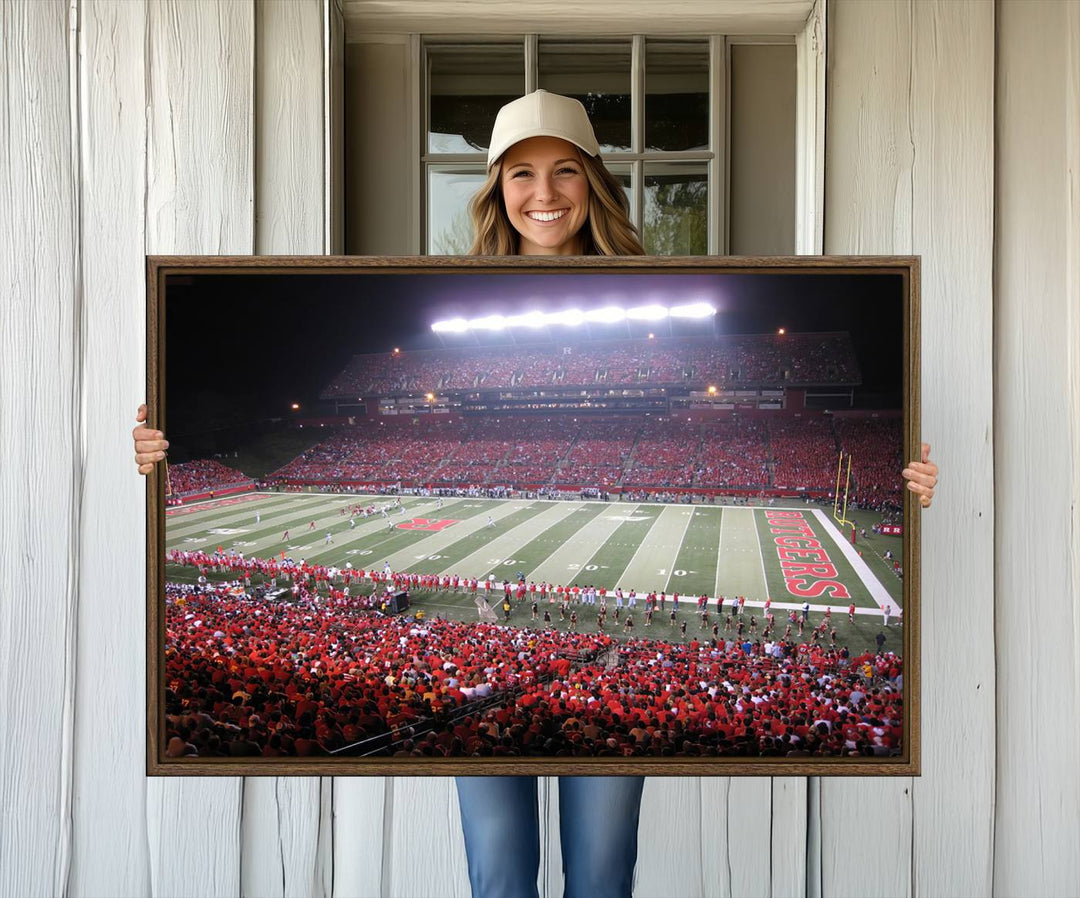 A bustling night game at SHI Stadium is captured as Rutgers Scarlet Knights wall art on a gallery-quality canvas print.