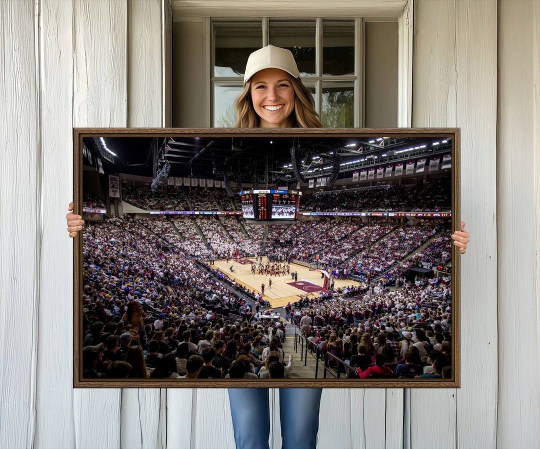 The Nebraska Basketball Arena Wall Art Canvas features an arena filled with Cornhuskers fans and players beneath a scoreboard.