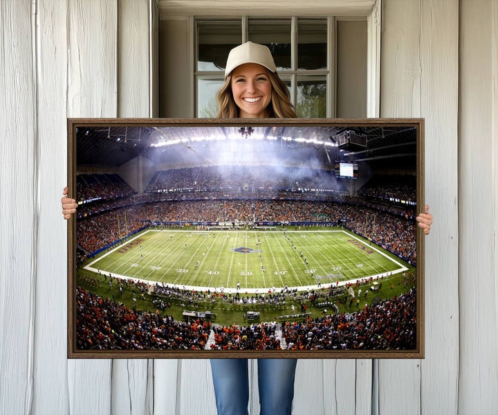 The modern living room features an Alamodome wall art canvas print, depicting a stadium filled with spectators for a UTSA Roadrunners game.