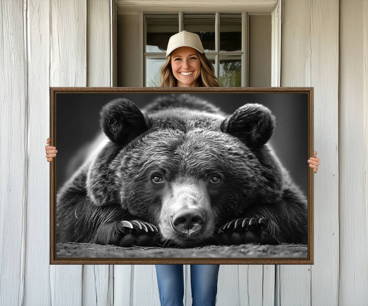 A black and white canvas print titled Resting Grizzly 399 Bear is displayed prominently.