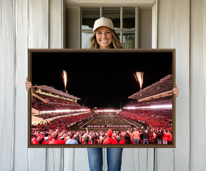 At Corvallis Reser Stadium, vibrant wall art captures the spirit of Oregon State Beavers football against a backdrop of a fireworks-lit night sky.