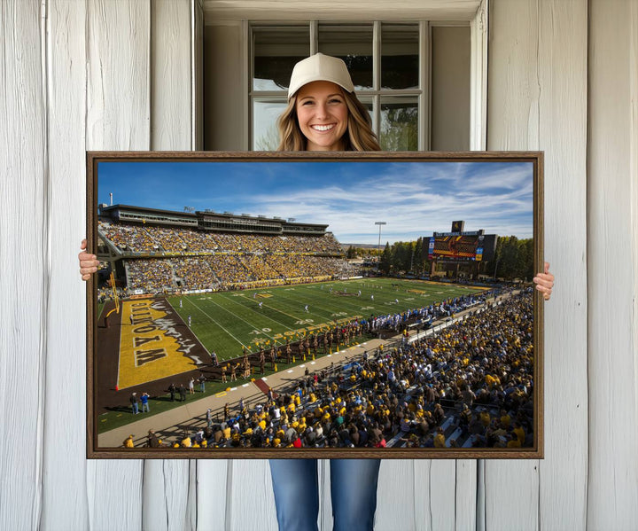 Canvas Wall Art Print: University of Wyoming Cowboys action at Jonah Field War Memorial Stadium under a sunny blue sky.