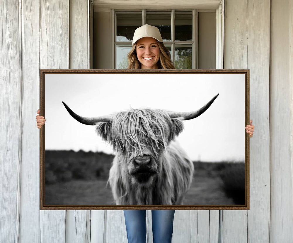 Highland Cow Wall Art: A black and white triptych canvas print, ideal for enhancing farmhouse or rustic barn decor.