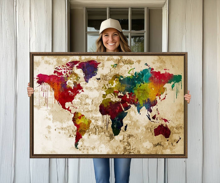 The Rainbow Colored Vintage World Map Canvas Print decorates the room.
