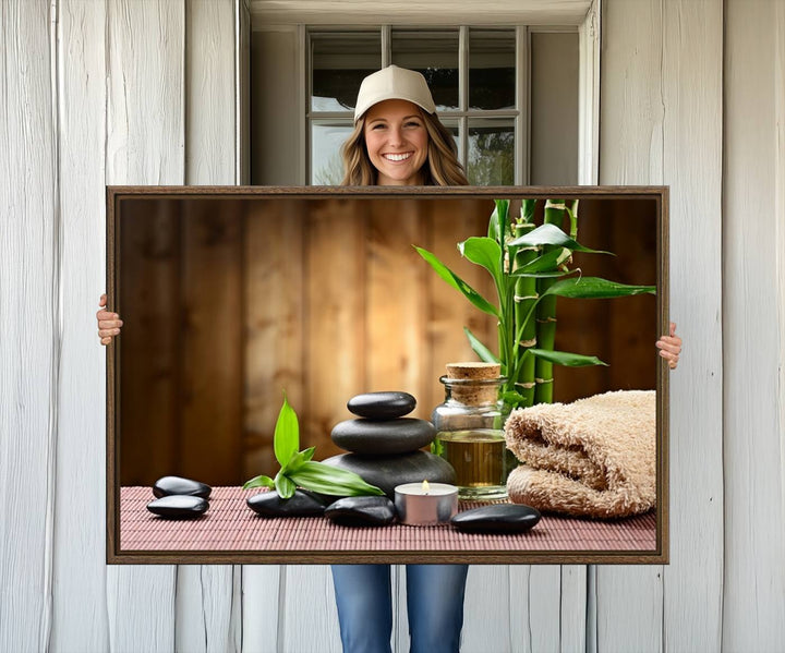 Zen Serenity Triptych Canvas Art: Pink Lotus Flower and Stones, Tranquil Water Lily Print, creating a peaceful spa ambiance.