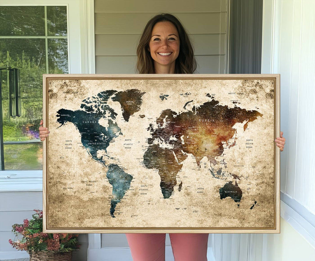 Vintage World Map Canvas Wall Art, perfect for antique-style decor, displayed against a light wood wall.