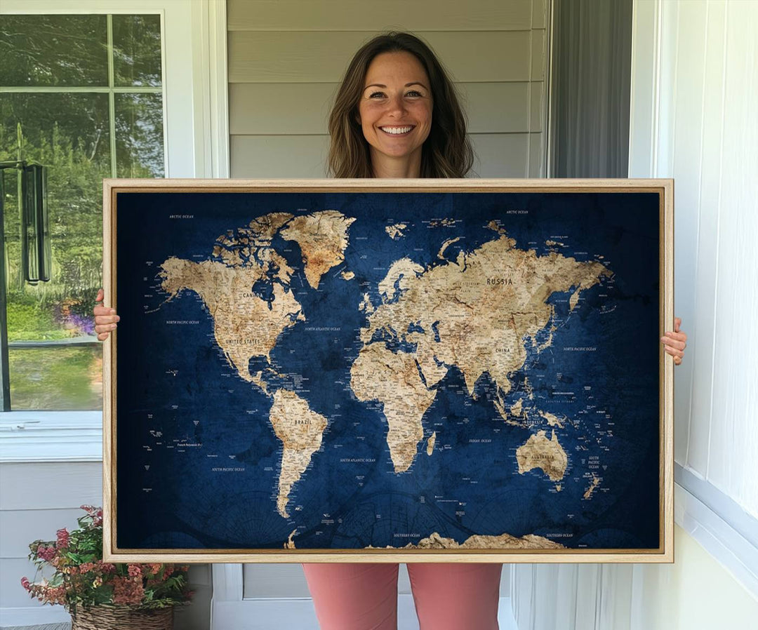 Classic Vintage Blue World Map Canvas Print featuring beige continents against a deep blue background.