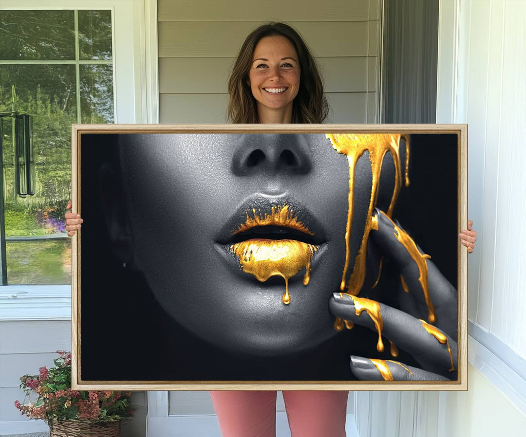 The Gold Lips and Black Woman Makeup Canvas Print features a chic monochrome face design, making it ideal for a modern dining room.