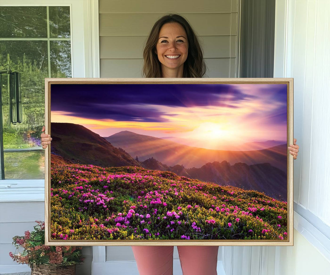 Gallery-wrapped wall art of a stunning mountain sunset and purple flowers.