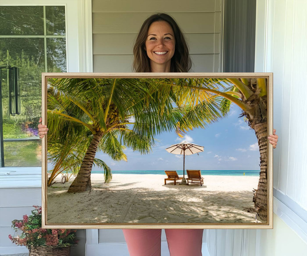 The canvas art print titled Lounge Chairs Palm Trees on Tropical Beach offers free shipping.