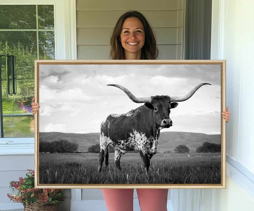 A Black and White Longhorn Texas Cow Canvas Wall Art.