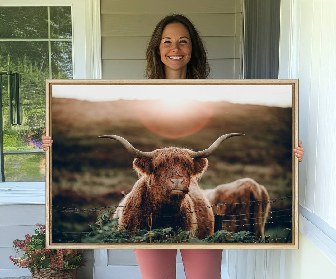 A Highland Cow Animal Canvas Wall Art, featuring a grassy field, is displayed on the wall.