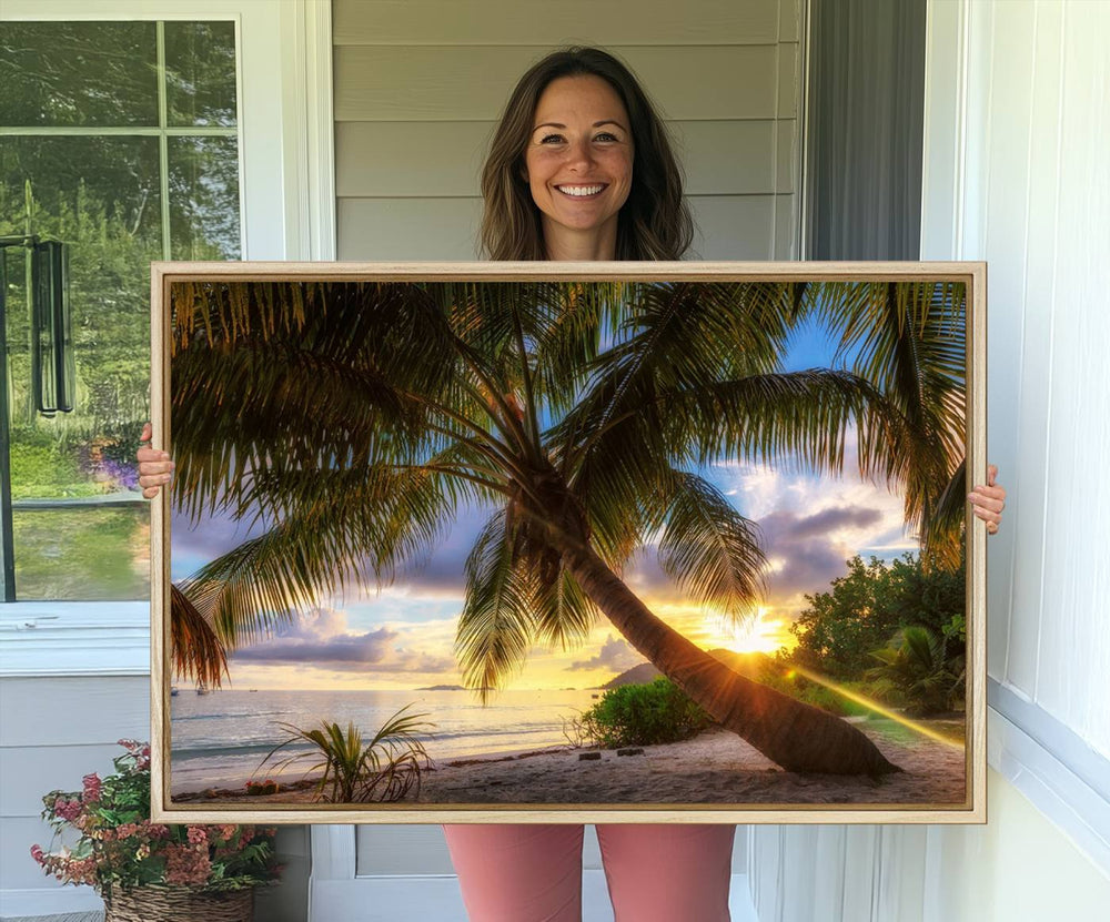 A Coastal Sunset Palm Tree canvas print hangs prominently.