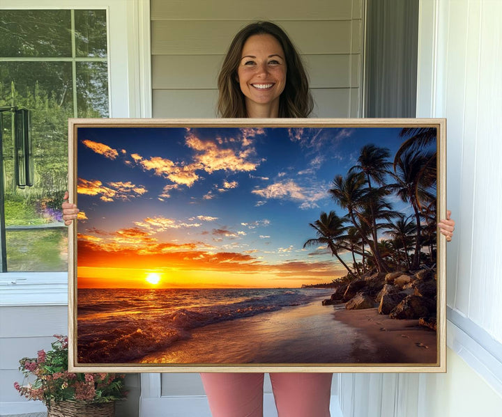 A stunning Tropical Beach Sunset Canvas Art featuring palm trees and ocean waves, created as a Giclee print.