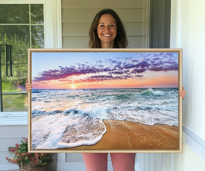 The Vivid Sunset Ocean Waves Triptych hangs on a wooden wall.