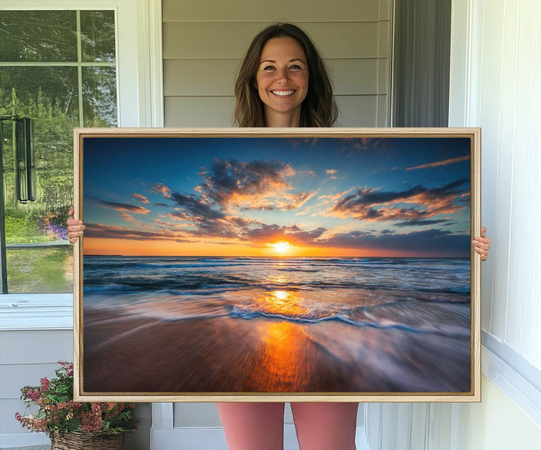 The Sunset on the Ocean canvas adds coastal ambiance to the wooden wall.