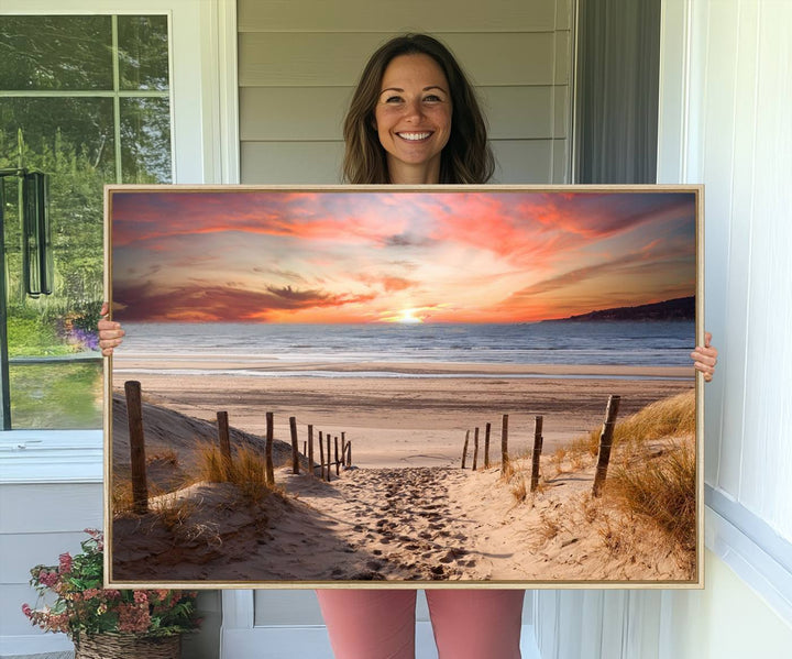 The Sunset on the Sea Wall Art Canvas Print beautifully captures a beach sunset and waves, enhanced with a UV-protective coating.