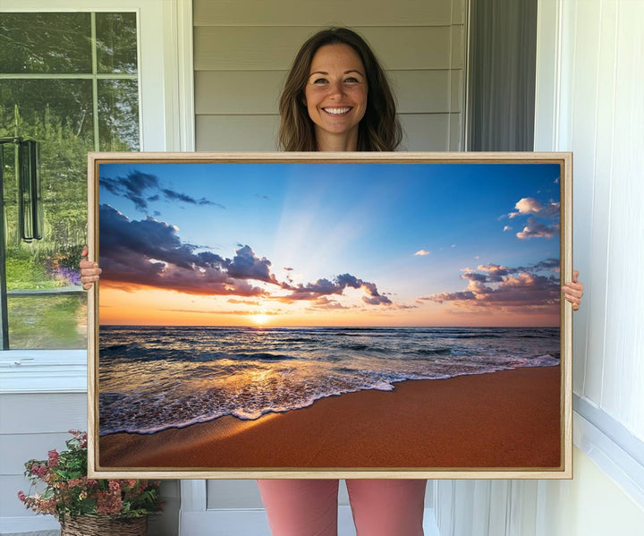 The living room showcases a Serene Ocean Sunset Canvas Print.