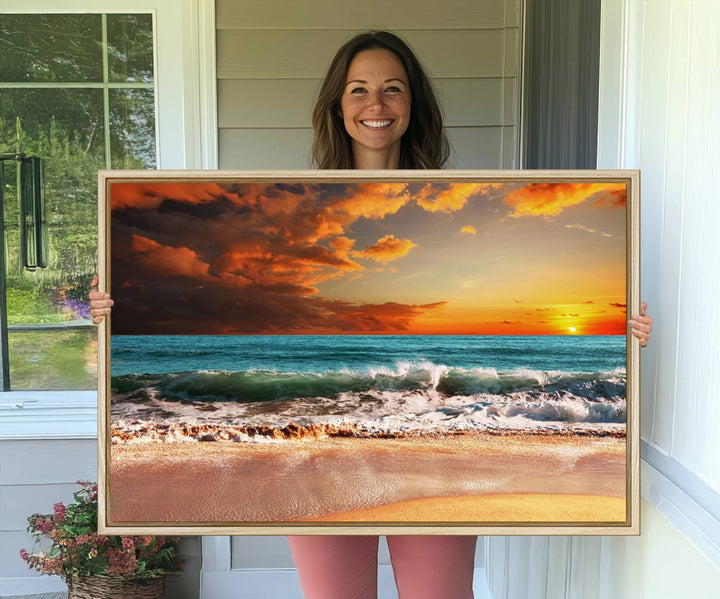 A Golden Sunset Beach triptych seascape canvas hangs on the wall.