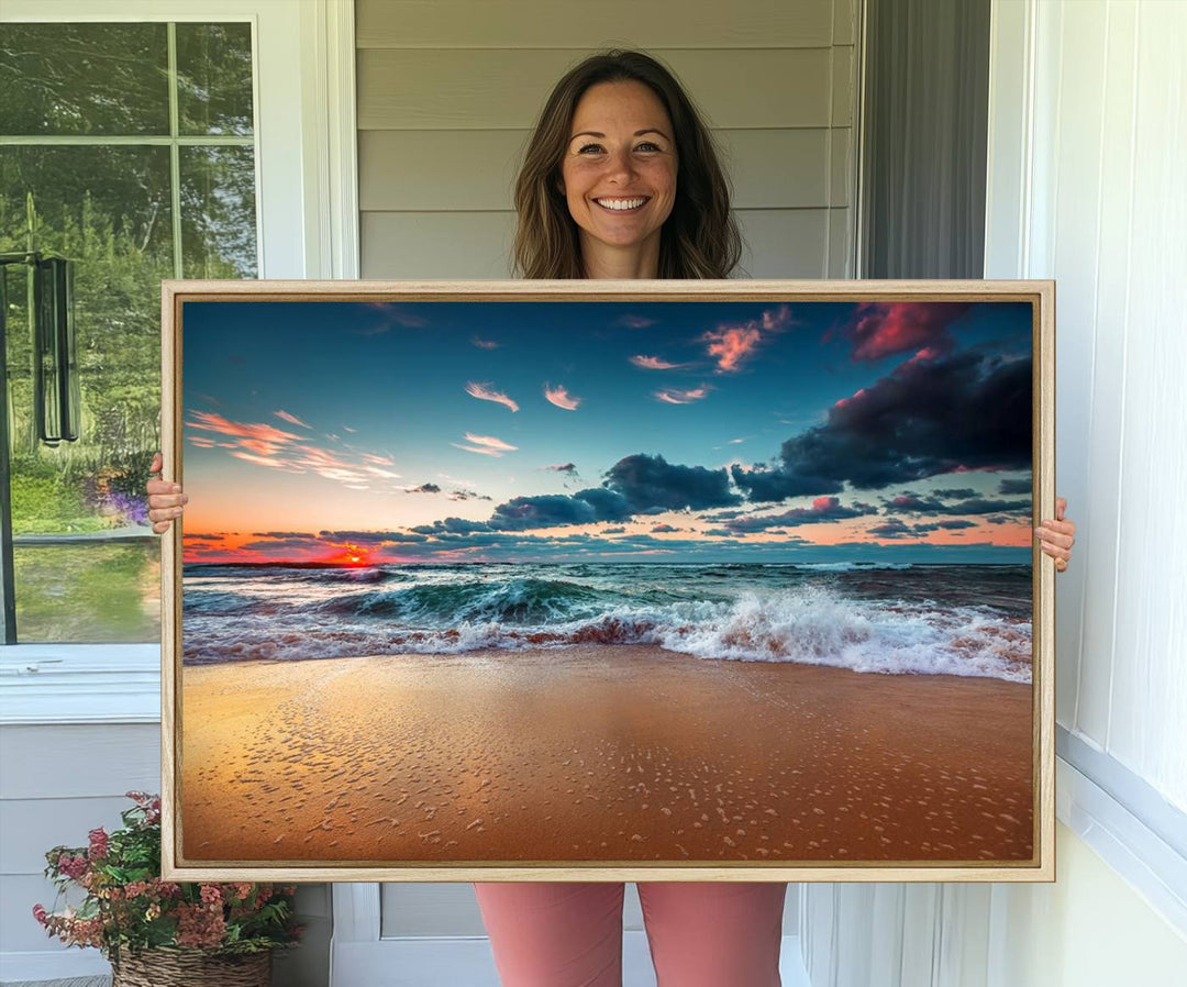 A large 3-panel sunset ocean beach canvas is displayed above the counter.