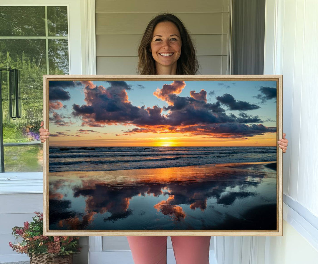 A Beach Sunset Print - Stunning Ocean Canvas Artwork adorns the wall.