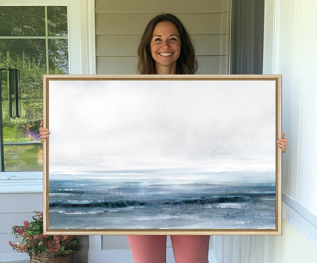 The dining area features Blue Ocean Abstract Artwork on canvas.