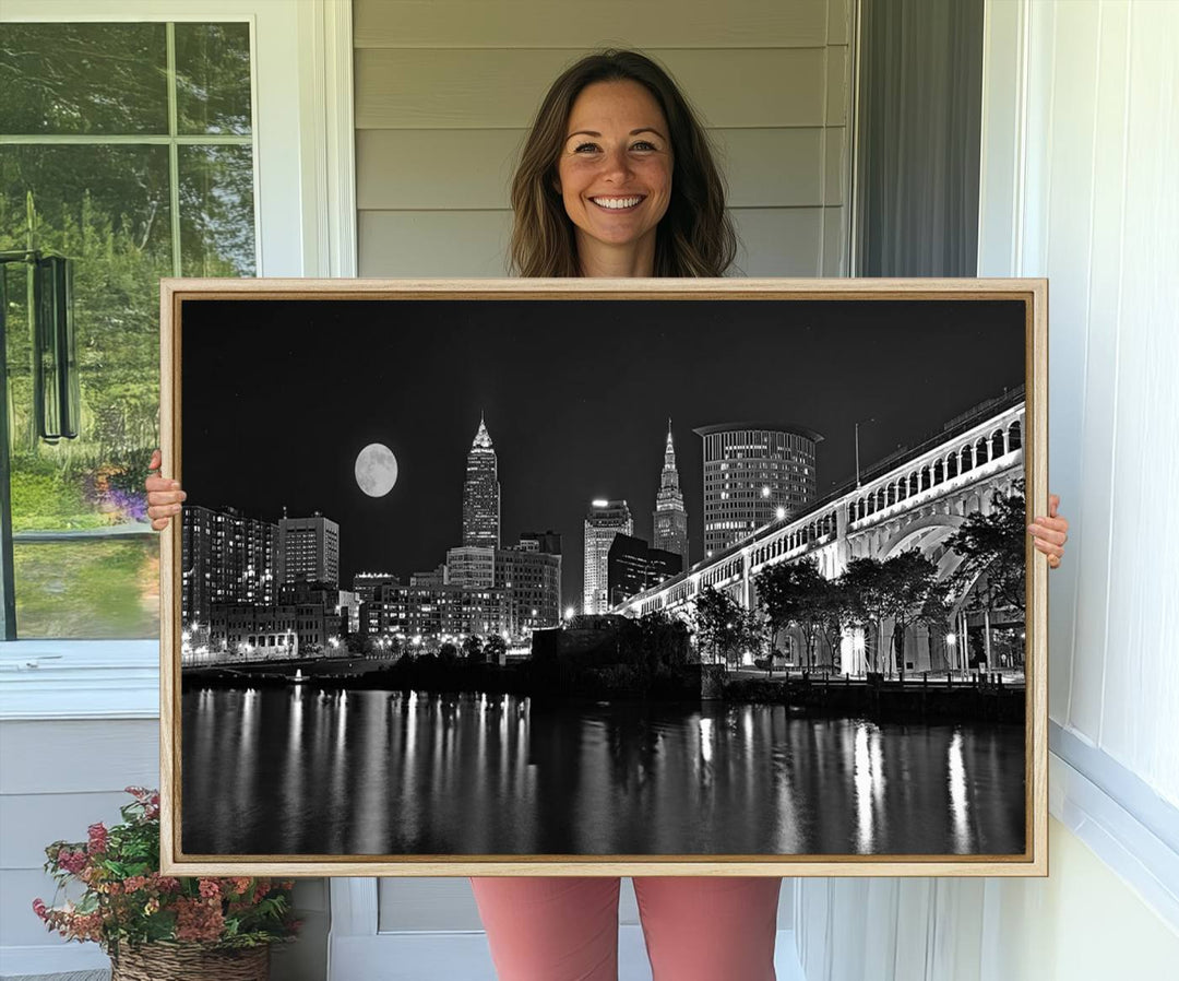 Cleveland Night Skyline Canvas Print: A museum-quality piece, ready to hang, featuring a stunning full moon and its reflections below.