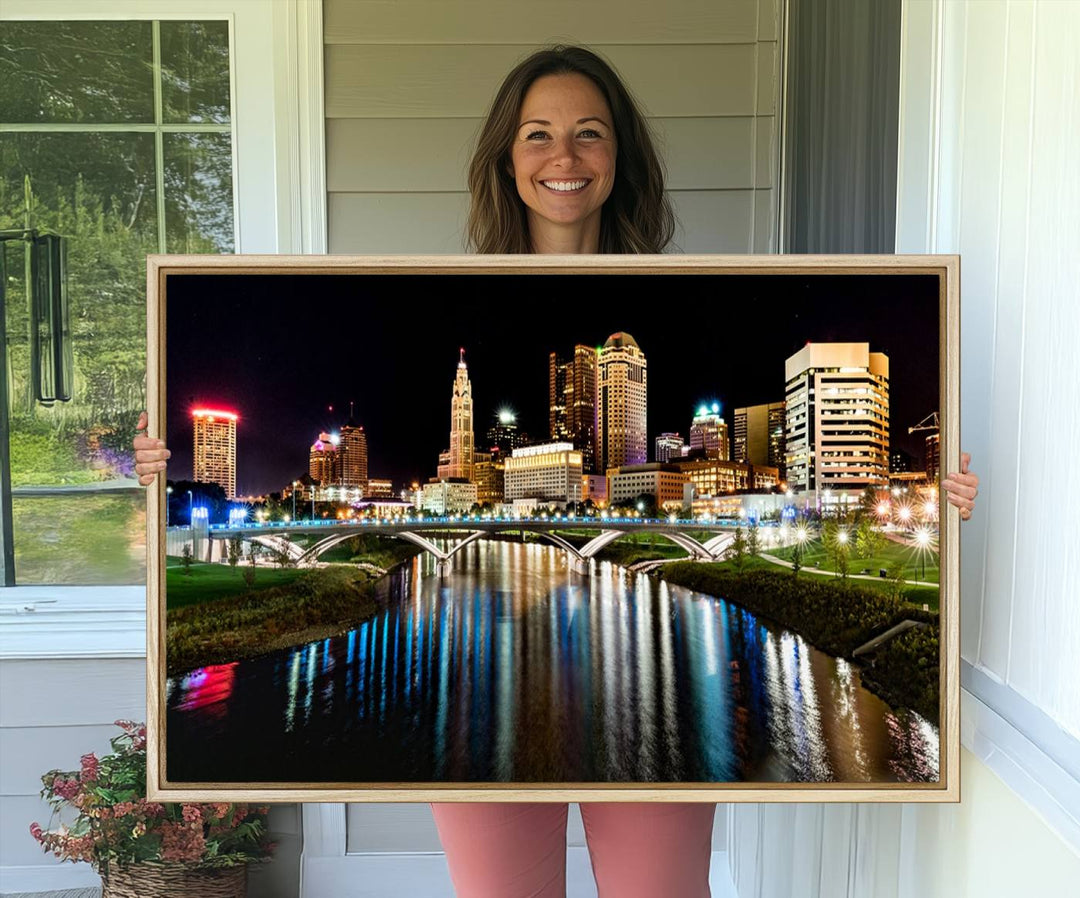 The Columbus City Lights Night Skyline Wall Art Canvas Print adorns the wall.