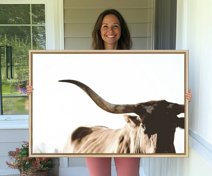 A 3-panel Texas Longhorn canvas adds a touch of rustic Western decor.