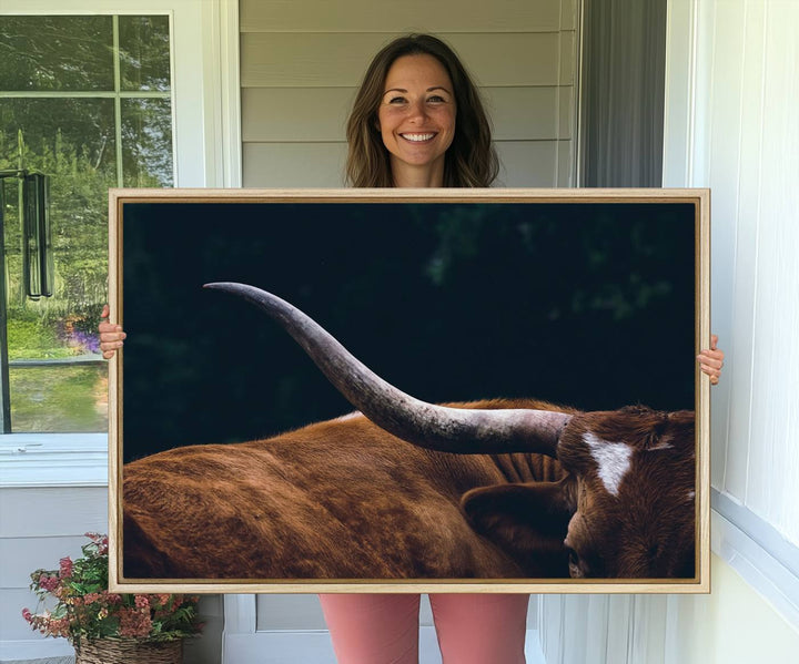 The kitchen dining area features a Texas Longhorn Bull wall art.