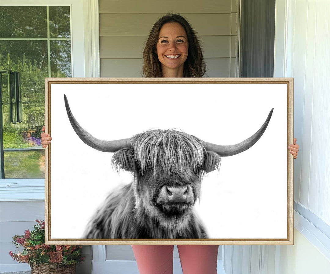 A Scottish Highland Cow Art Canvas adds charm to the farmhouse decor.