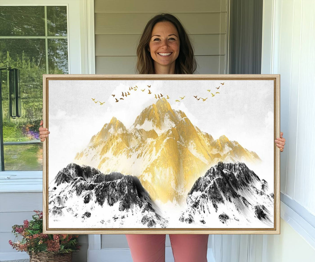 Golden Mountain Triptych Wall Art features gold-tinted mountains and birds.