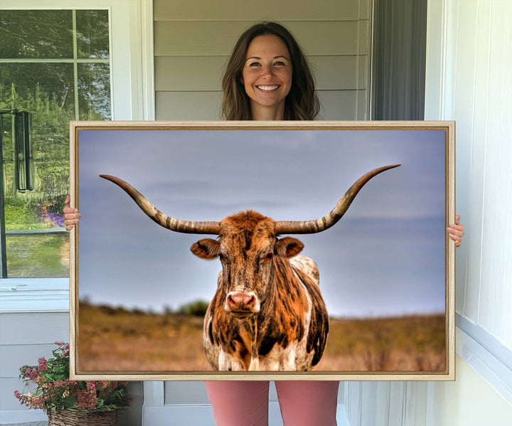 The Texas Longhorn Wall Art Print is displayed in a stylish living room.