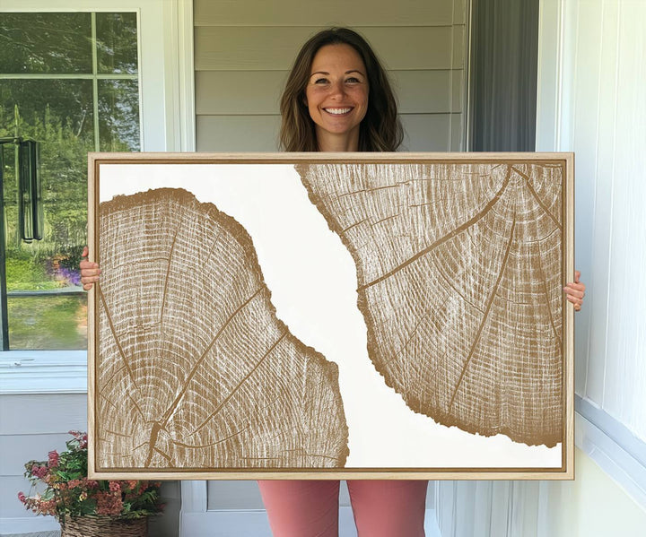 The rustic wall art features two large tree rings, beautifully framed and displayed to create a nature-inspired décor.