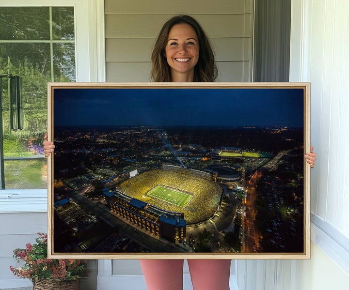 Aerial view of Michigan Stadium nightlife on canvas – Framed, ready-to-hang sports arena wall art.