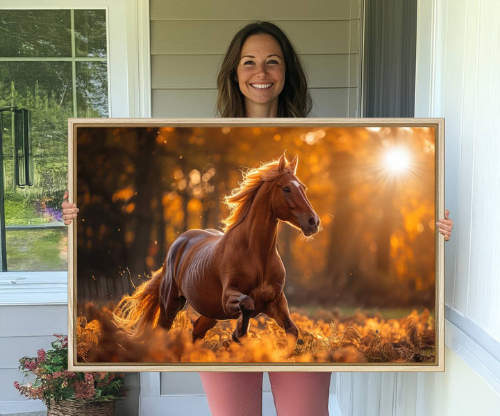 The Running Horse Sunset Forest Wall Art Canvas Print showcases a gallop in an autumn forest with sunlight streaming through the trees.