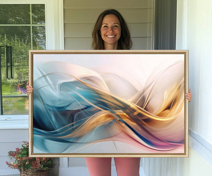 Abstract Flowing Colors Wall Art featuring blue, gold, and pink adds modern elegance to the space.