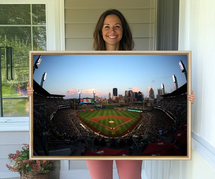 The PNC Park Evening Game Canvas, featuring a skyline backdrop, is displayed on the wall.