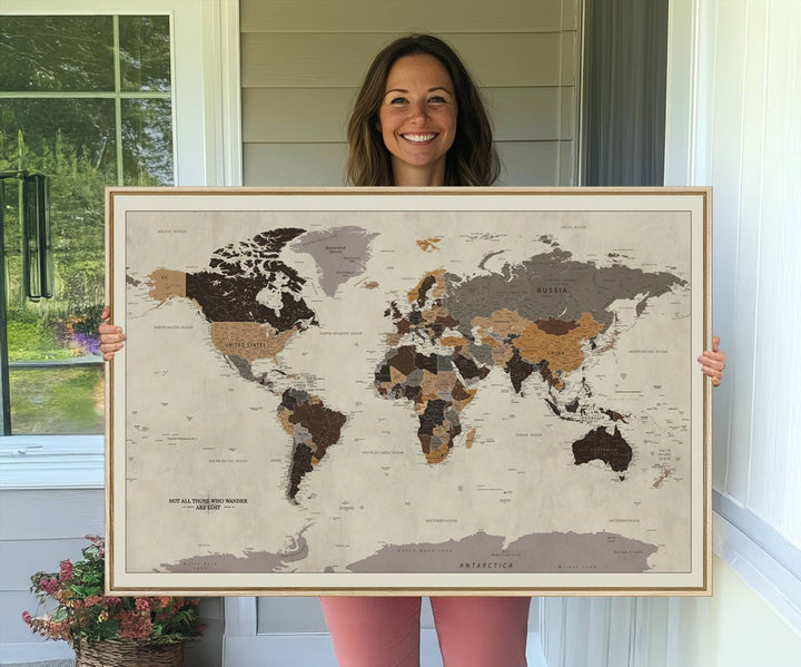 A vintage world map on beige canvas, featuring countries in brown and black shades.