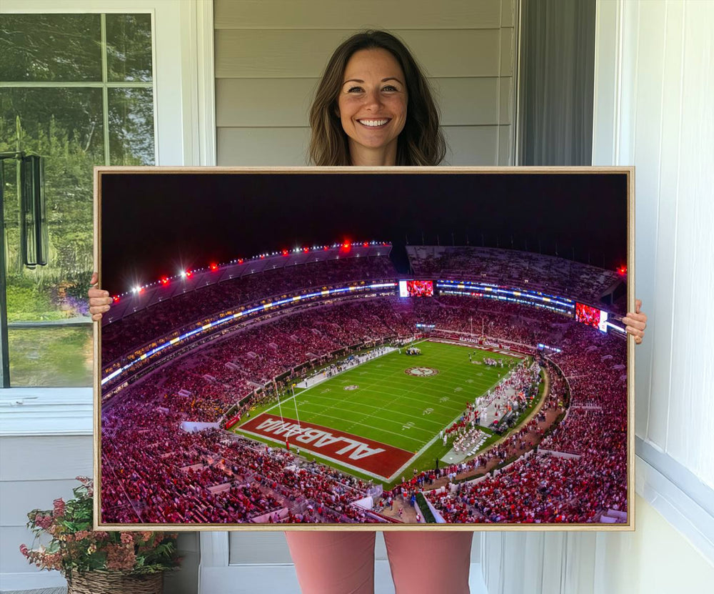 The living room features a Bryant-Denny Stadium Night Game Triple Canvas Wall Art.