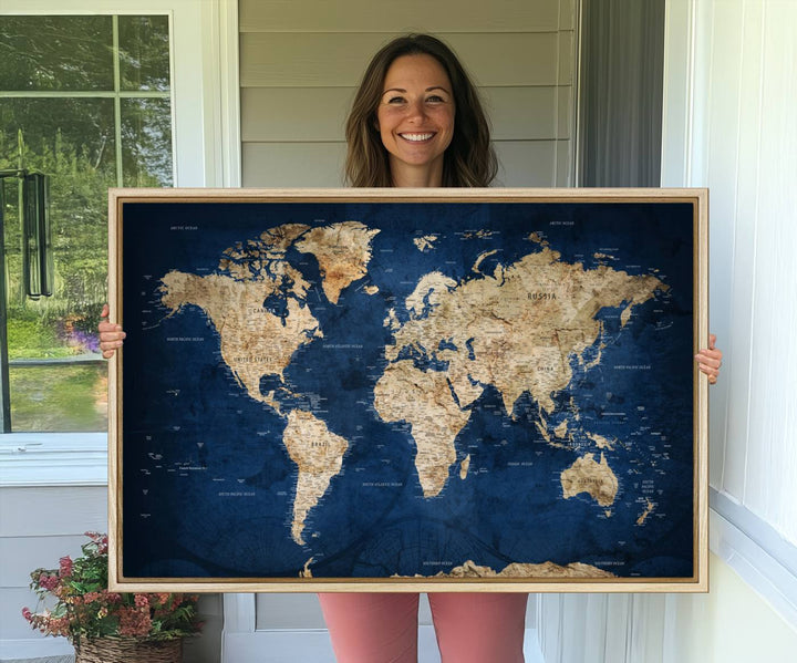 A personalized world map canvas print hangs above.