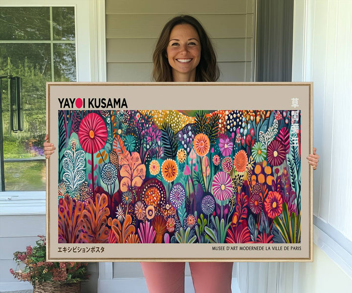 A vibrant Yayoi Kusama Wall Art Canvas Print is held on a porch.