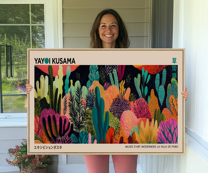 A vibrant Yayoi Kusama Wall Art Canvas Print showcases intricate abstract flora on a light background.