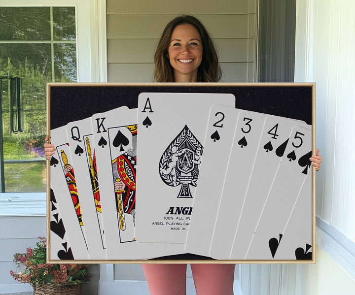 The oversized Poker Wall Art features the Ace of Spades and is displayed on a porch.