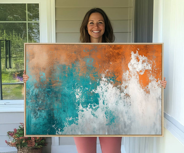 The Vintage Abstract Print - Bold Teal and Orange Canvas Wall Art is displayed on a porch.