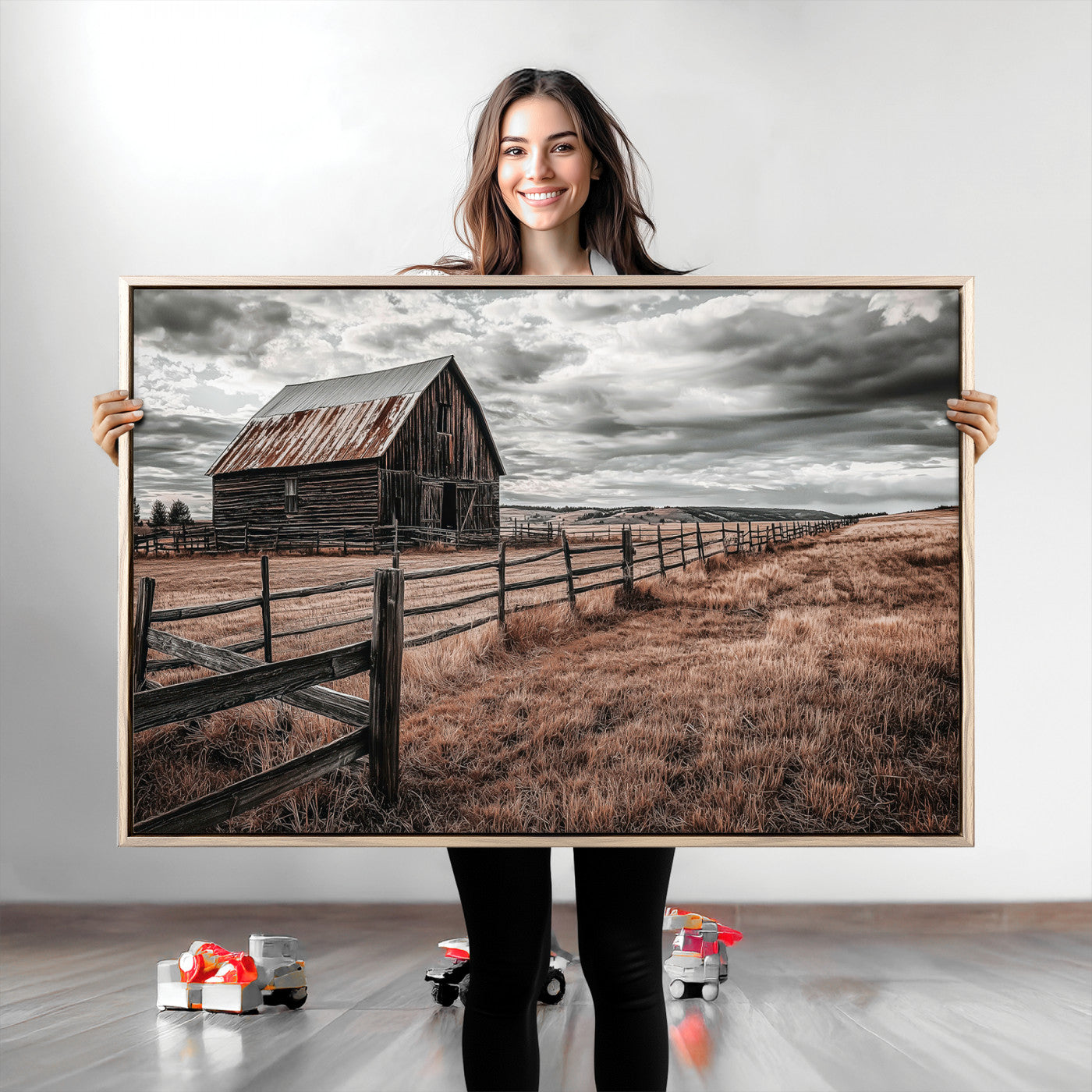 Framed canvas of a rustic barn under a moody sky with weathered fence and dark fields, ideal for farmhouse or rural-style wall decor.