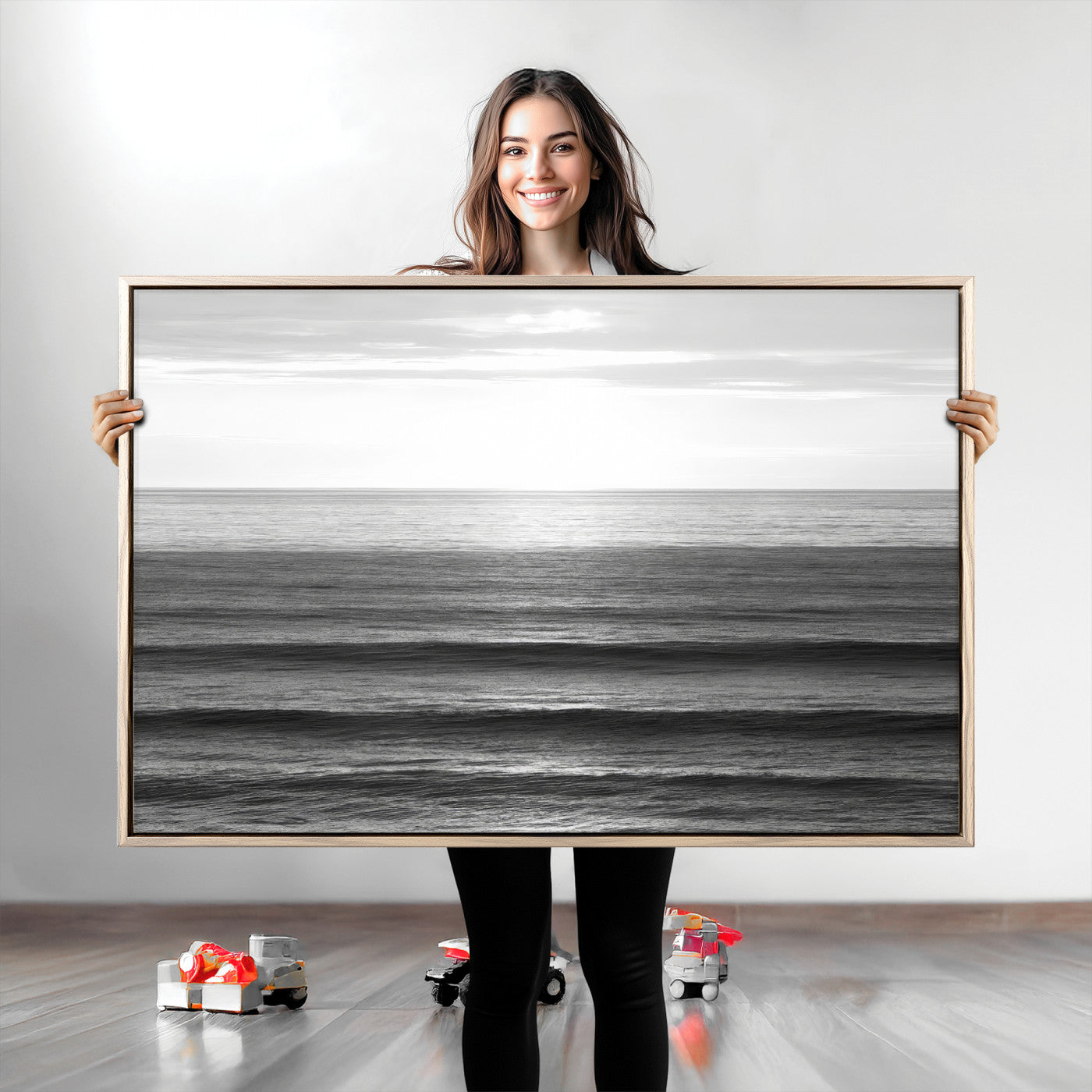 Minimalist black and white ocean view with layered waves reflecting sunlight, evoking a sense of calm and coastal serenity.