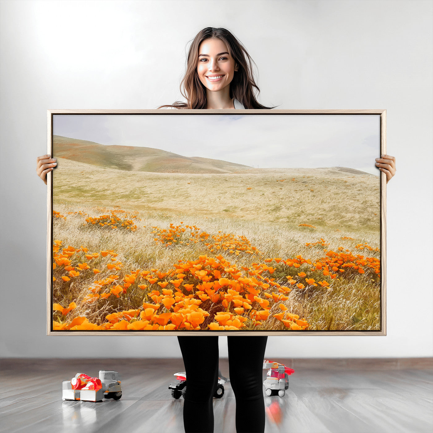 A golden field with vibrant orange poppies blooming across rolling hills under a soft, sunlit sky, creating a warm and rustic landscape.